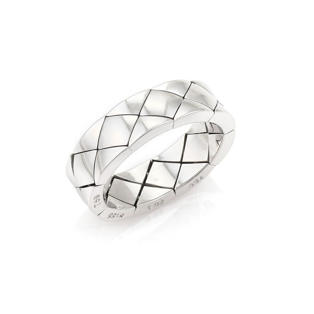 Chanel Matelasse 18k White Gold 7mm Flexible Band Ring Size 9: Chanel Matelasse 18k White Gold 7mm Flexible Band Ring Size 9 This Chanel Matelasse ring is crafted from 18k white gold and features a 7mm wide flexible band. Signed by Chanel, the ring is designed in