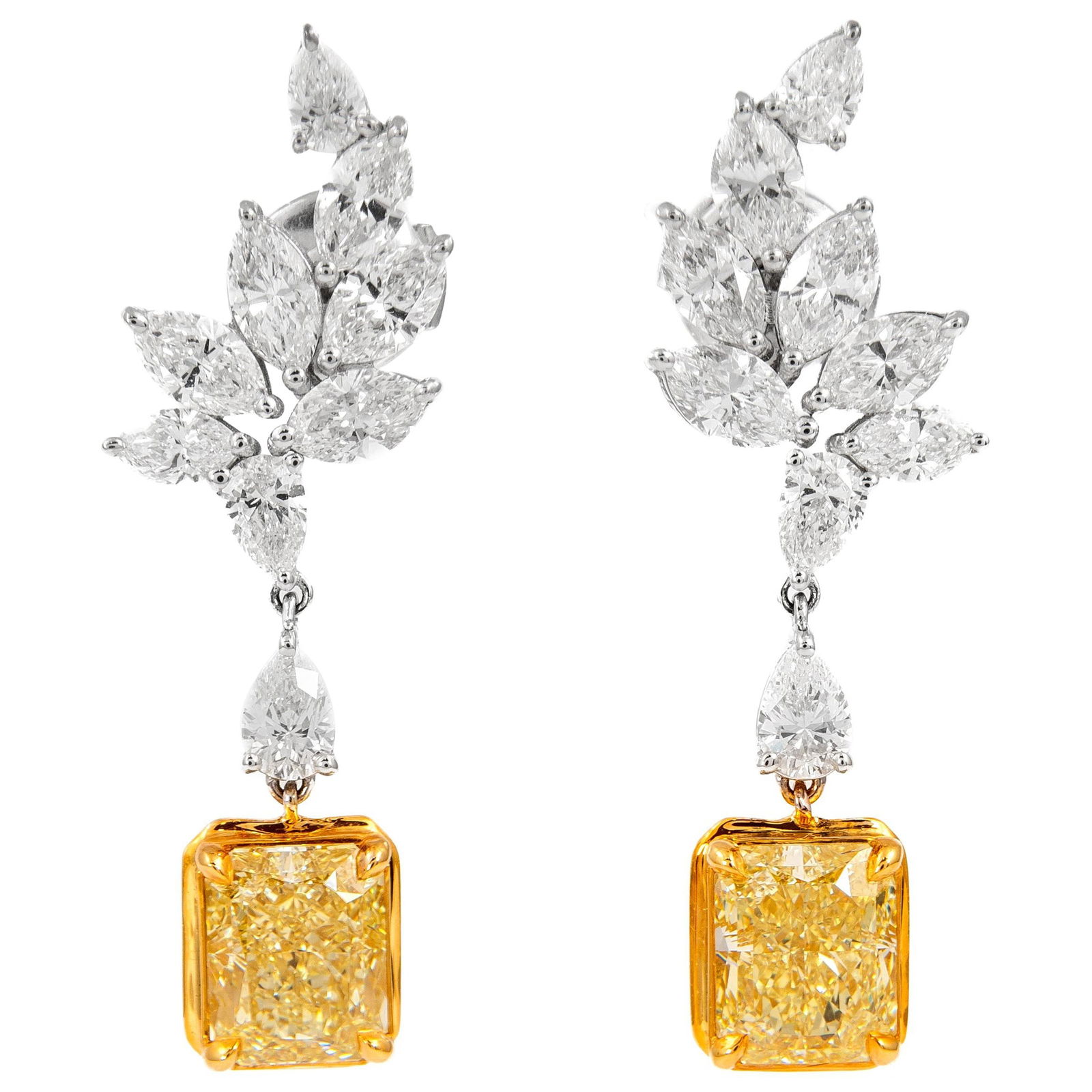 Fancy Yellow Diamond Drop Earrings 8.40ct GIA Certified 18k Gold: Fancy Yellow Diamond Drop Earrings 8.40ct GIA Certified 18k Gold Elevate your elegance with these stunning drop earrings featuring a total of 8.40 carats of GIA certified fancy yellow diamonds. The