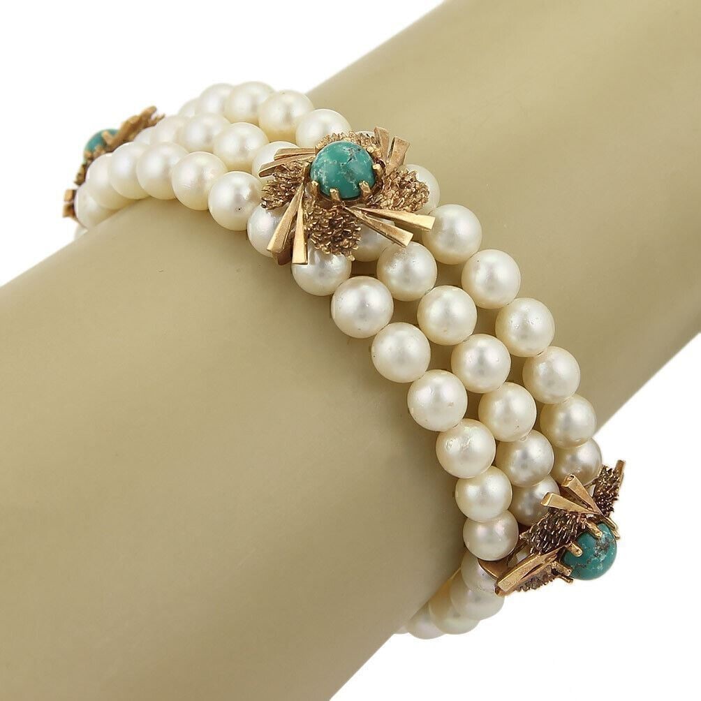 Three Strand Pearl and Green Agate Beaded Bracelet in 14k Yellow Gold: Three Strand Pearl and Green Agate Beaded Bracelet in 14k Yellow Gold This vintage bracelet features three strands of pearls accented with green agate beads, all set in 14k yellow gold. The beaded des