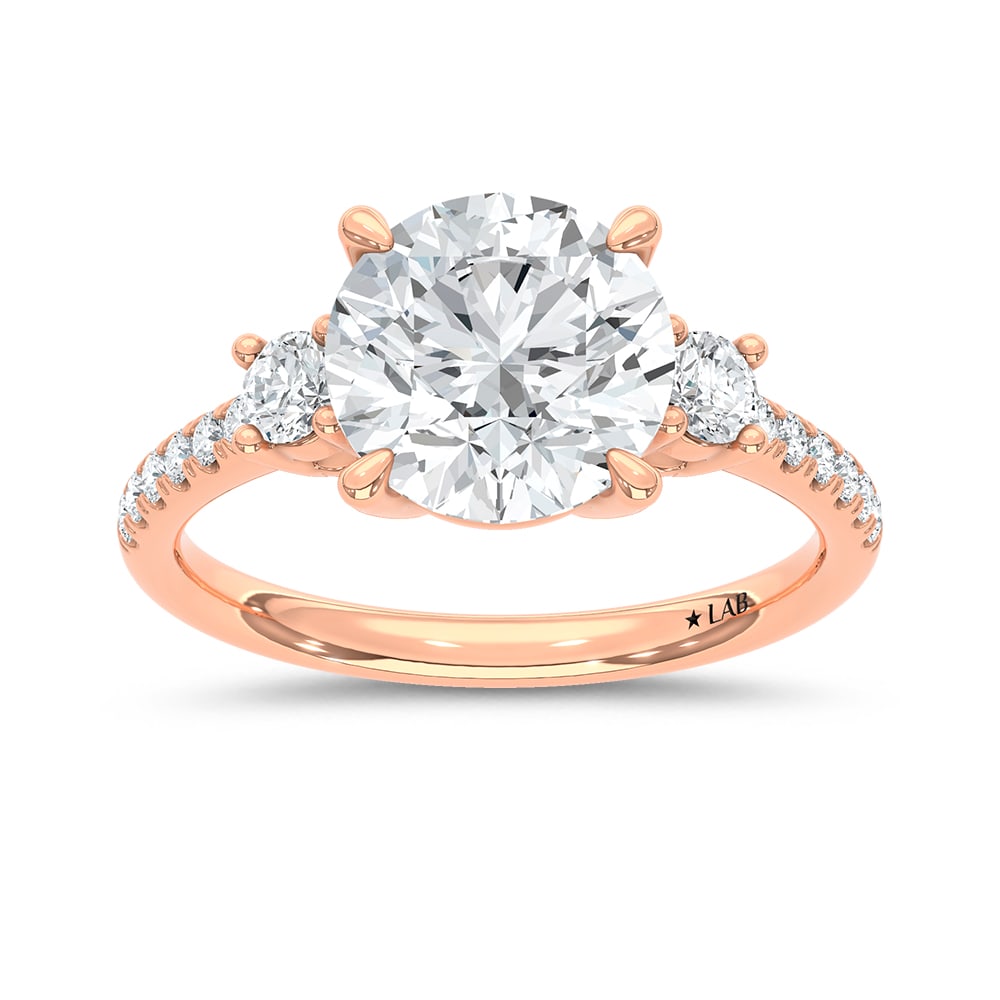 14K Rose Gold Lab Grown Diamond 2 3/8 Ct.Tw. Round Shape Engagement Ring (IGI Certified Center 3ct): 14K Rose Gold Lab Grown Diamond 2 3/8 Ct.Tw. Round Shape Engagement Ring (IGI Certified Center 3ct) Shine brilliantly with this exquisite 14K Rose gold engagement ring, featuring a stunning 3-carat IG