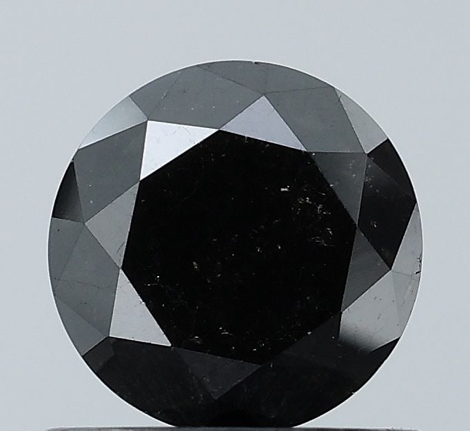 Loose Diamond - ROUND 0.76ct Black VS2: Loose Diamond - ROUND 0.76ct Black VS2 Source: Natural Shape: ROUND Carats: 0.76 Color: Black Certification: NONE Video: