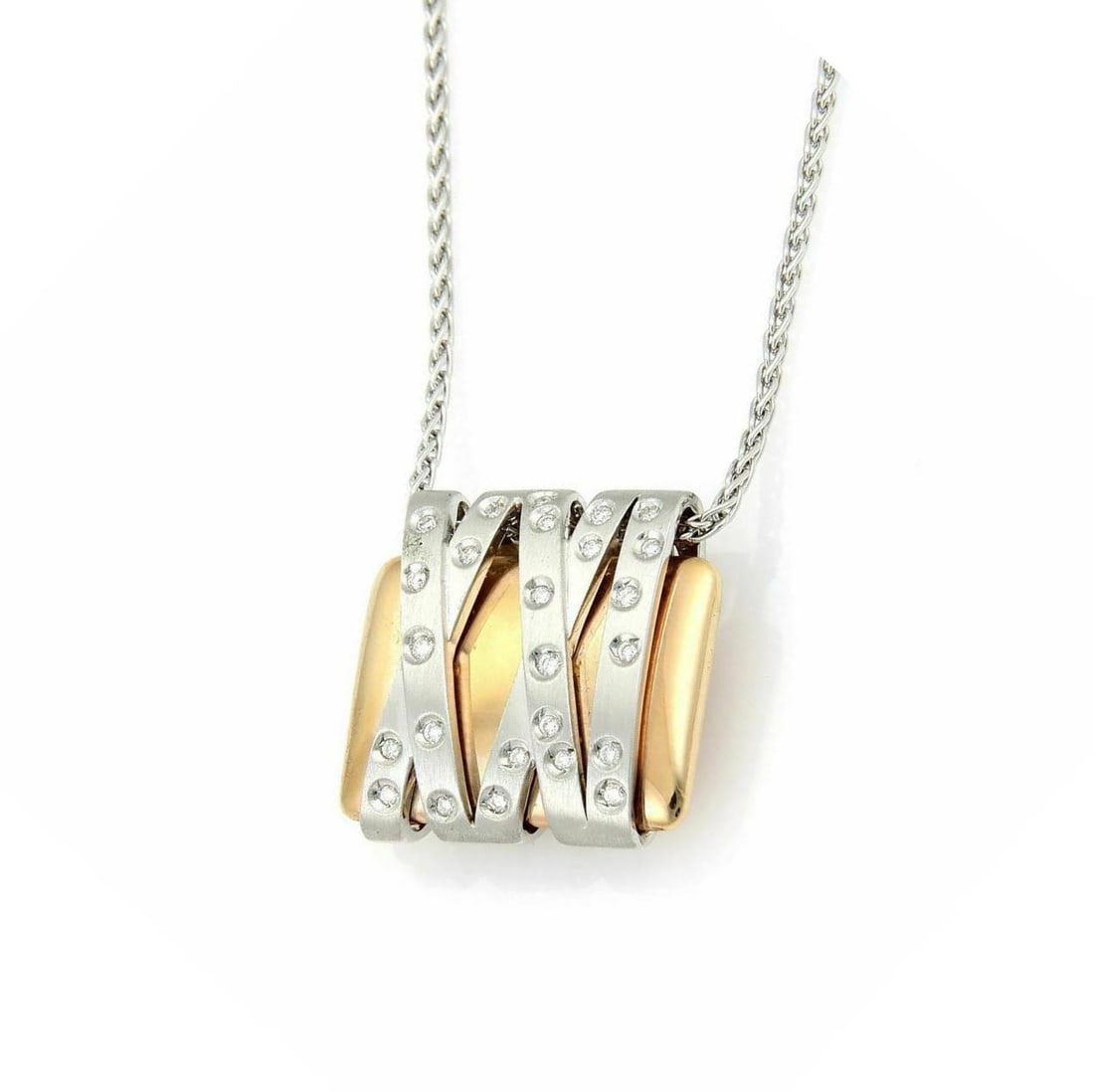 Diamond Pendant Necklace in 18k Two Tone Gold by Koesis Italy: Diamond Pendant Necklace in 18k Two Tone Gold by Koesis Italy This original Koesis Italy pendant necklace features a sophisticated crossover design crafted in 18k two-tone gold and is set with 0.21ct