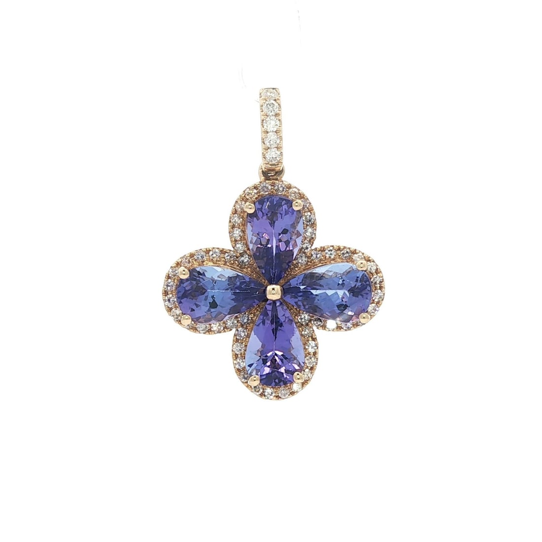 Effy 14k Yellow Gold 3.75ctw Tanzanite Diamond Clover Flower Pendant: Effy 14k Yellow Gold 3.75ctw Tanzanite Diamond Clover Flower Pendant This exquisite pendant showcases a stunning clover flower design crafted in solid 14k yellow gold. The centerpiece features four pe