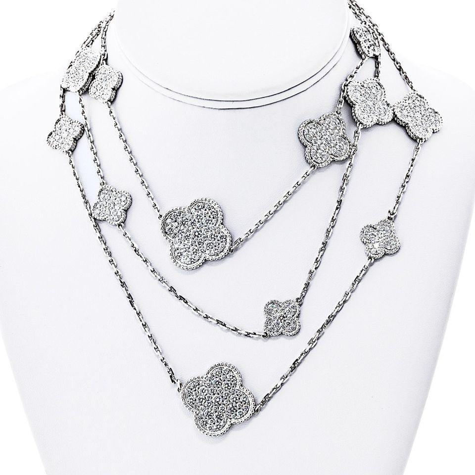 Van Cleef & Arpels Magic Alhambra Necklace 16 Diamond Motifs in 18K White Gold: Van Cleef & Arpels Magic Alhambra Necklace 16 Diamond Motifs in 18K White Gold This pre-owned Van Cleef & Arpels Magic Alhambra necklace features 16 iconic Alhambra motifs crafted in rhodium-plated 18