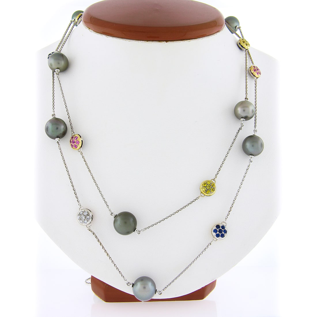 Elegant 18k Gold 46" Necklace with Tahitian Pearls Sapphires Diamonds: Elegant 18k Gold 46" Necklace with Tahitian Pearls Sapphires Diamonds This stunning 46-inch long chain necklace showcases a luxurious combination of 18k white gold and yellow gold accents, featuring 1