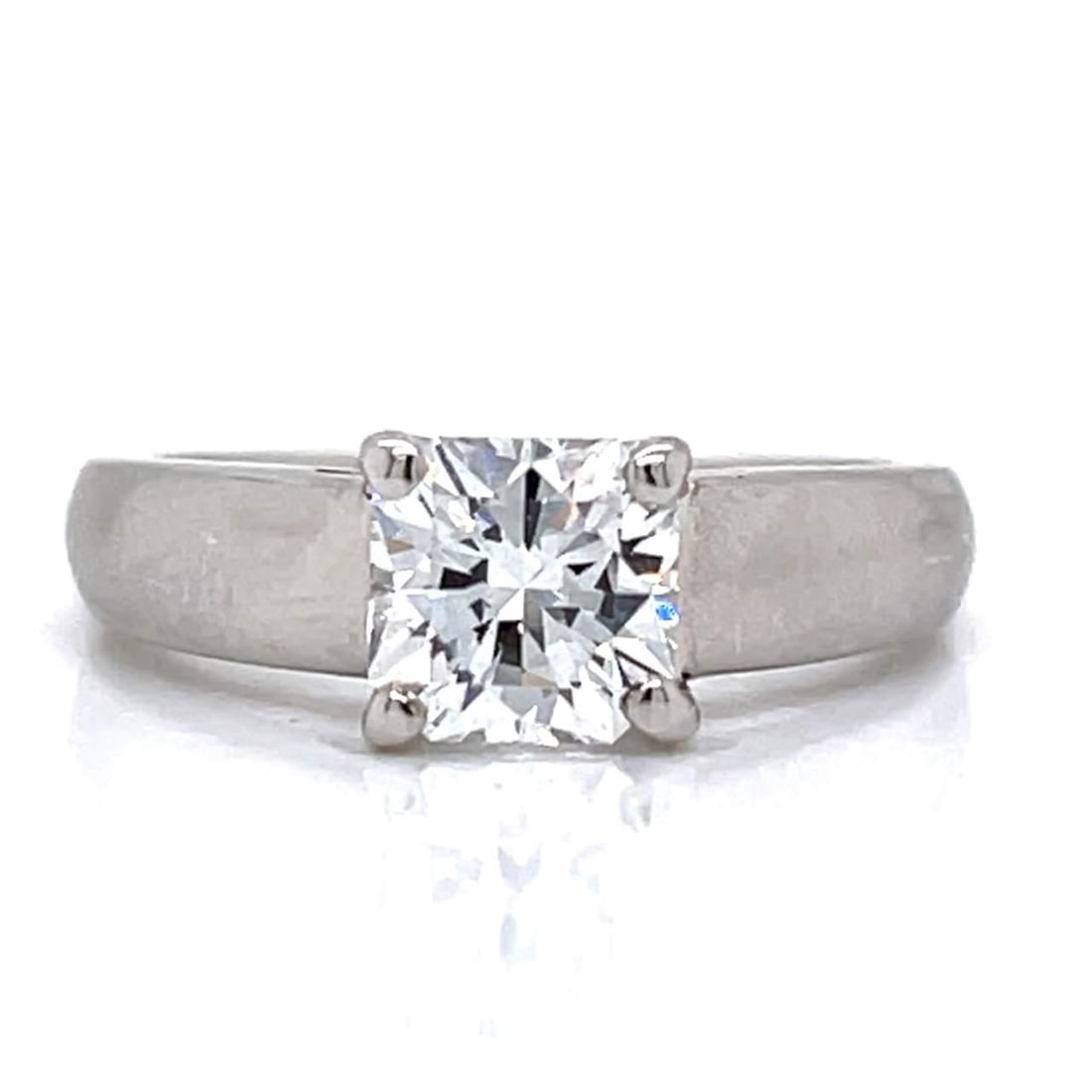 GIA Certified Platinum 1.24 Ct Emerald Cut Diamond Ring: GIA Certified Platinum 1.24 Ct Emerald Cut Diamond Ring This stunning Platinum ring features a GIA Certified 1.24 Ct. Emerald-cut Diamond, showcasing exceptional quality with E Color and VVS2 Clarity.