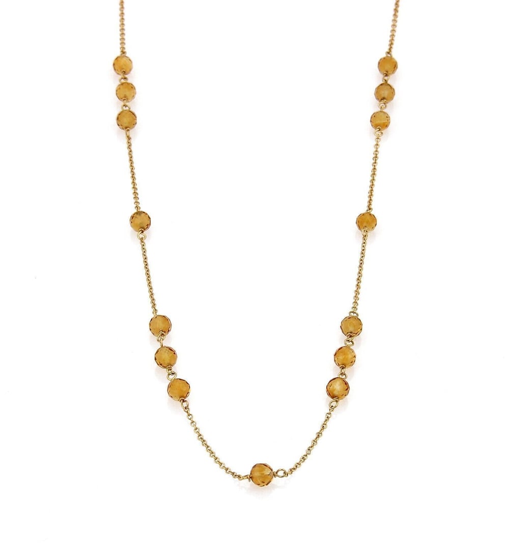 24 Inch Faceted Citrine and 18k Gold Bead Necklace by Tiffany & Co.: 24 Inch Faceted Citrine and 18k Gold Bead Necklace by Tiffany & Co. This vintage Tiffany & Co. necklace features faceted citrine beads elegantly set in 18k yellow gold. Measuring 24 inches in length,