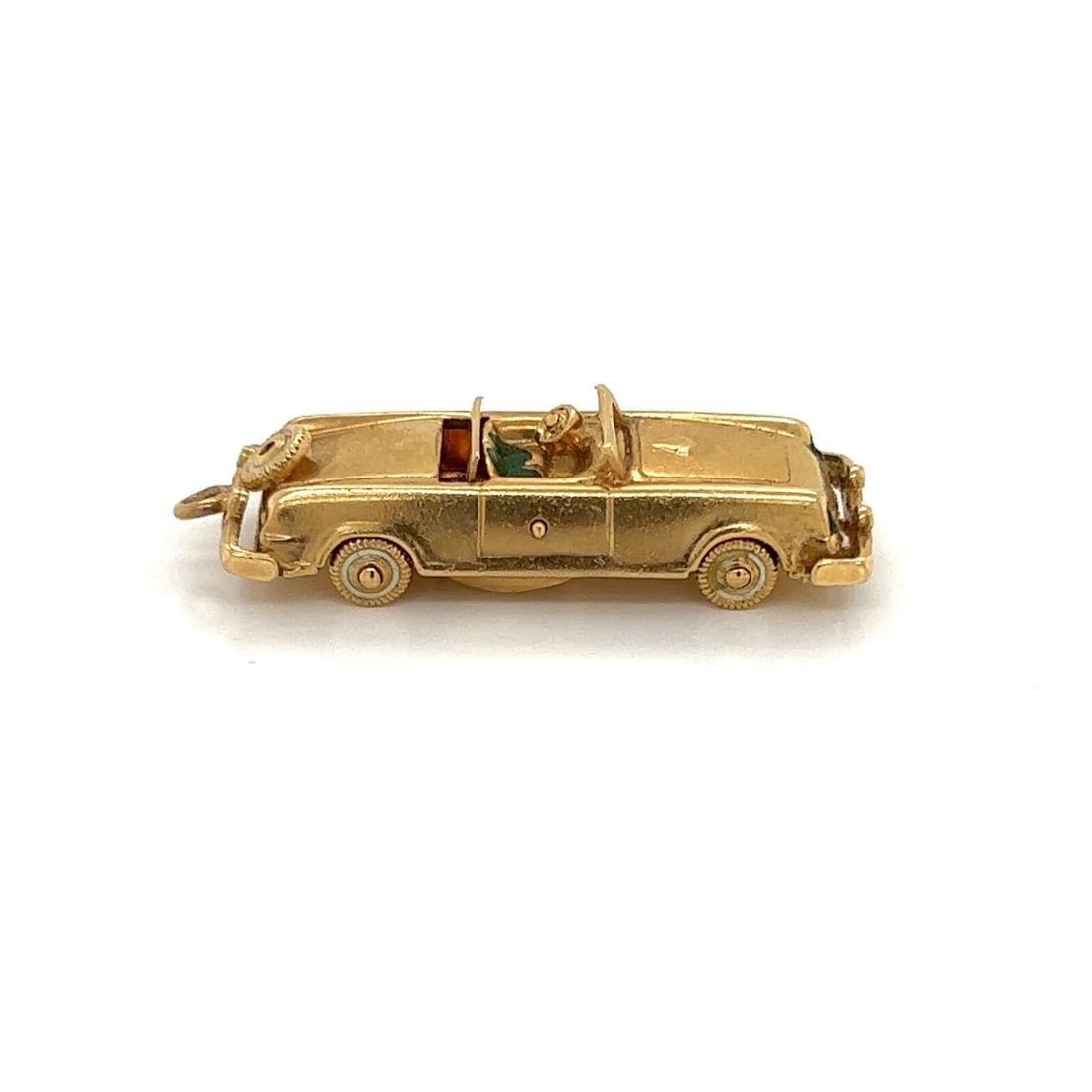 14k Yellow Gold Vintage Enamel Classic Car Pendant Charm: 14k Yellow Gold Vintage Enamel Classic Car Pendant Charm This vintage pendant showcases a classic car design, crafted in solid 14k yellow gold and adorned with colorful enamel detailing. It is a disti