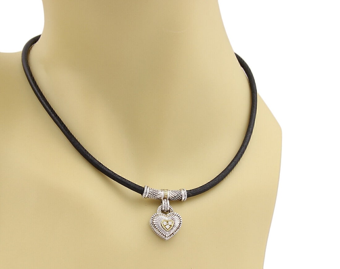 Heart Pendant Necklace in Sterling Silver 18k Gold with Diamonds by Judith Ripka: Heart Pendant Necklace in Sterling Silver 18k Gold with Diamonds by Judith Ripka This Judith Ripka necklace features a heart-shaped pendant crafted from sterling silver and 18k yellow gold, adorned wi