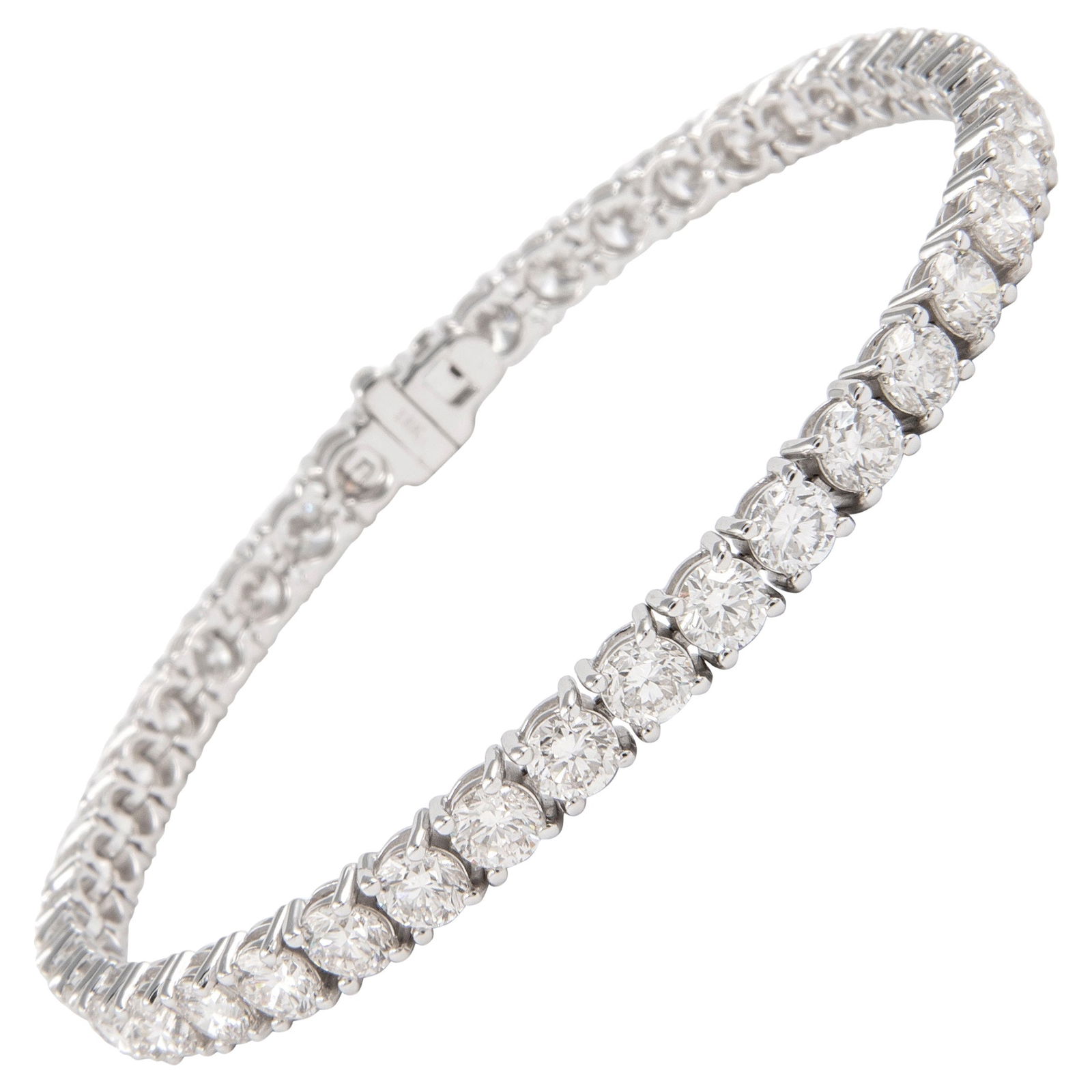 9.88ct Diamond Tennis Bracelet 18k White Gold Modern Design: 9.88ct Diamond Tennis Bracelet 18k White Gold Modern Design This exquisite 9.88ct diamond tennis bracelet is crafted from 18k white gold, showcasing a modern design perfect for any occasion. It featur
