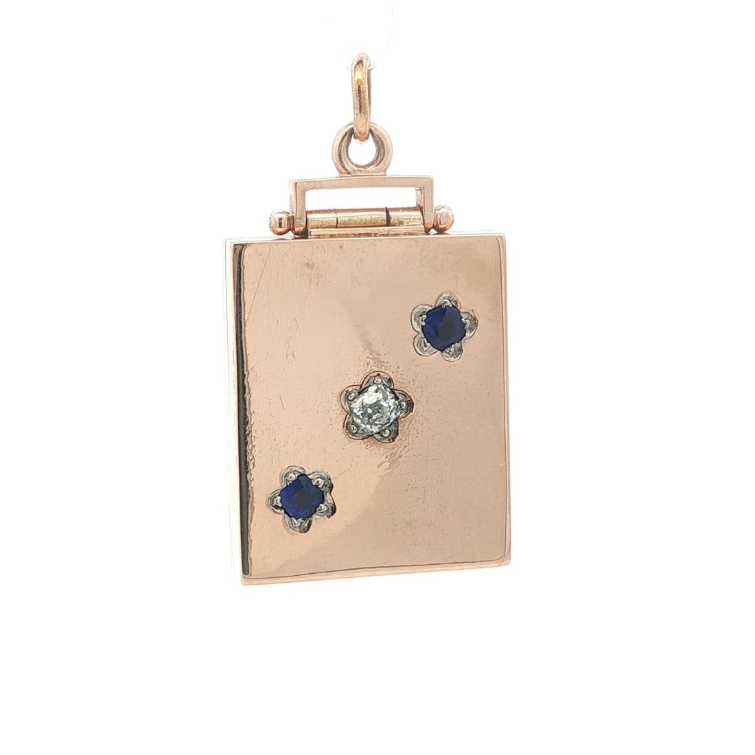 Large Antique Rectangular Locket in Solid Rosy Gold with Star Pave Diamond: Large Antique Rectangular Locket in Solid Rosy Gold with Star Pave Diamond This antique locket features a large rectangular design crafted from solid 11-14k rosy gold, with the bail being gold filled.