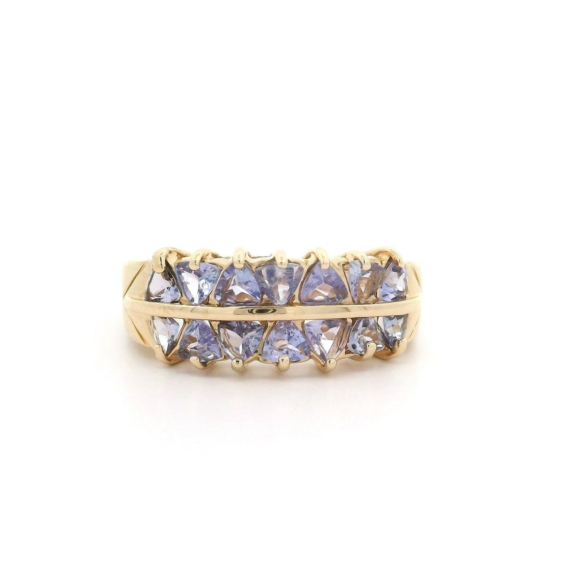 14k Yellow Gold Dual Row Tanzanite Trillion Cut Band Ring: 14k Yellow Gold Dual Row Tanzanite Trillion Cut Band Ring This stunning band ring features a dual row of fourteen natural genuine Tanzanite stones, each expertly cut into a trillion shape and prong se