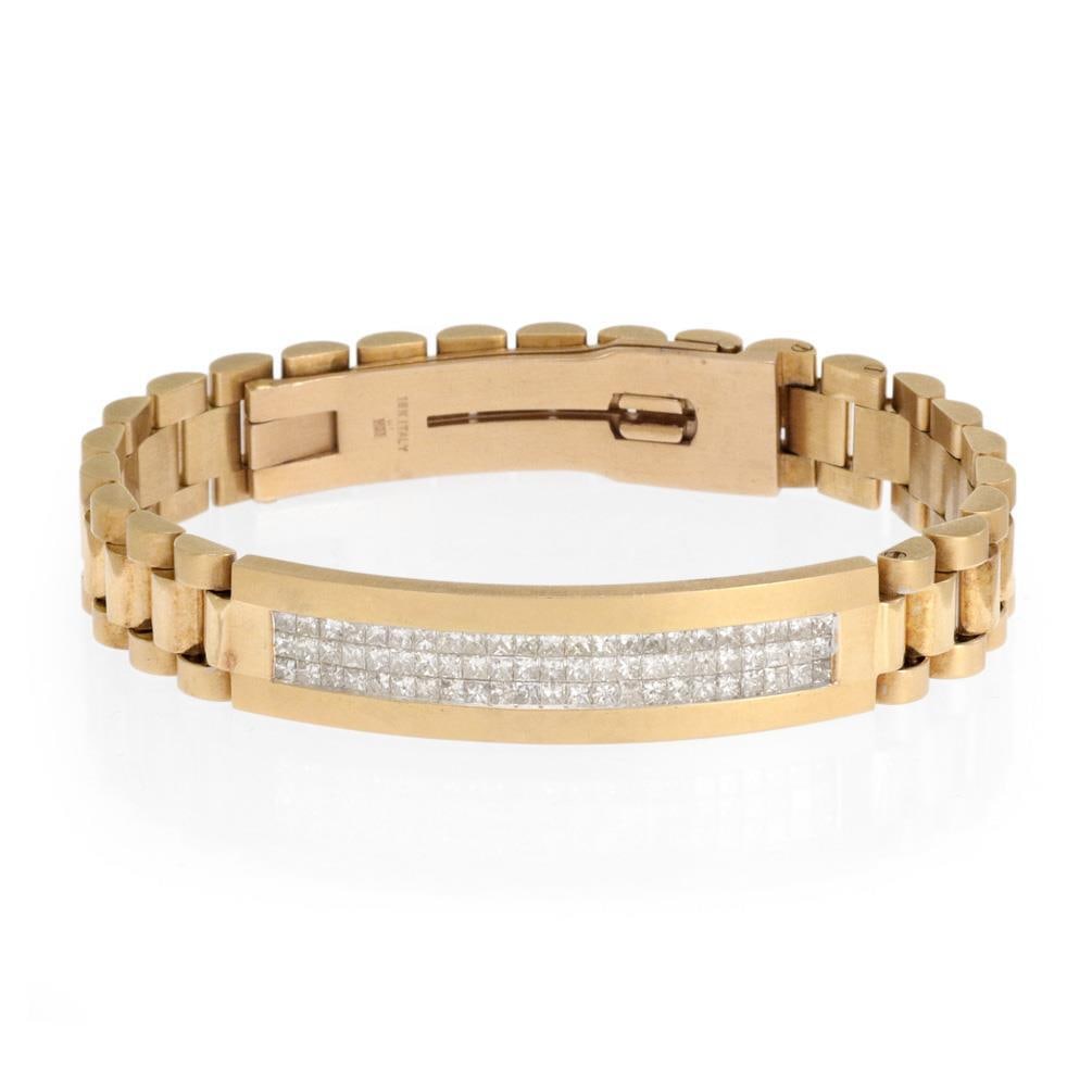 18k Gold Flex Link Bracelet with 3.3ct Invisible Set Diamonds: 18k Gold Flex Link Bracelet with 3.3ct Invisible Set Diamonds Make a statement with this striking men's bracelet, expertly crafted from 18k yellow gold featuring a sophisticated matte and polished fin