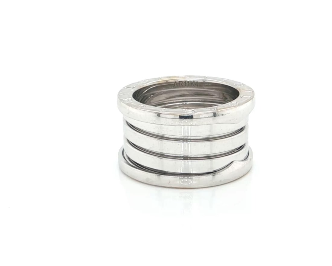 Bvlgari B.zero1 Four-Band 18k White Gold Ring Size 5 With Certificate: Bvlgari B.zero1 Four-Band 18k White Gold Ring Size 5 With Certificate This Bvlgari B.zero1 Four Band ring is crafted in 18k white gold with a high-polished finish. The design features the signature sp