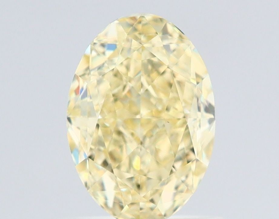 Loose Diamond - OVAL 1.07ct Fancy Light Yellow VS2: Loose Diamond - OVAL 1.07ct Fancy Light Yellow VS2 Source: Natural Shape: OVAL Carats: 1.07 Color: Fancy Light Yellow Certification: GIA Video: