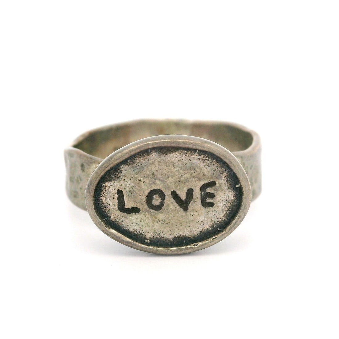 Vintage Sterling Silver LOVE Hammered Band Ring Size 8: Vintage Sterling Silver LOVE Hammered Band Ring Size 8 This vintage band ring features a unique hammered finish and is crafted from high-quality sterling silver (.925). The ring showcases the word "LO