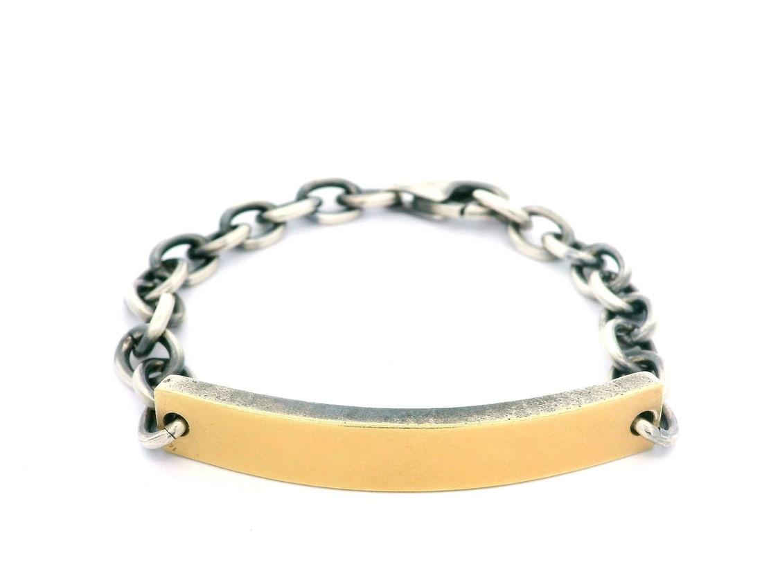 Unbranded 6.5 Inch Sterling Silver and 14k Yellow Gold Plate ID Bracelet: Unbranded 6.5 Inch Sterling Silver and 14k Yellow Gold Plate ID Bracelet This exquisite bracelet features a beautiful combination of sterling silver and 14k yellow gold plating, showcasing an open cab
