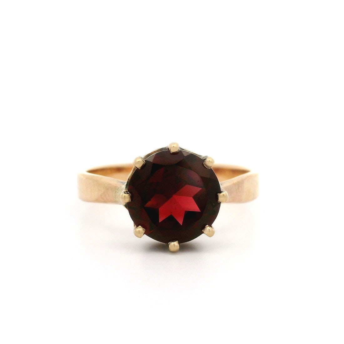 Vintage 4.10ct Round Garnet Solitaire Ring in Rosy Yellow Gold: Vintage 4.10ct Round Garnet Solitaire Ring in Rosy Yellow Gold This exquisite vintage ring features a stunning 4.10ct natural garnet, elegantly round cut and set in a multi-prong design. The garnet sh