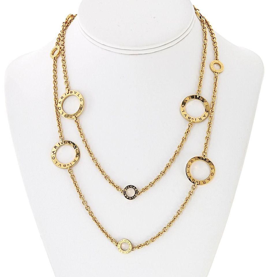Bvlgari 18K Yellow Gold Sautoir Necklace 37 Inches: Bvlgari 18K Yellow Gold Sautoir Necklace 37 Inches This exquisite Bvlgari necklace is a stunning example of luxury jewelry design. Crafted from premium 18K yellow gold, this 37-inch sautoir showcases