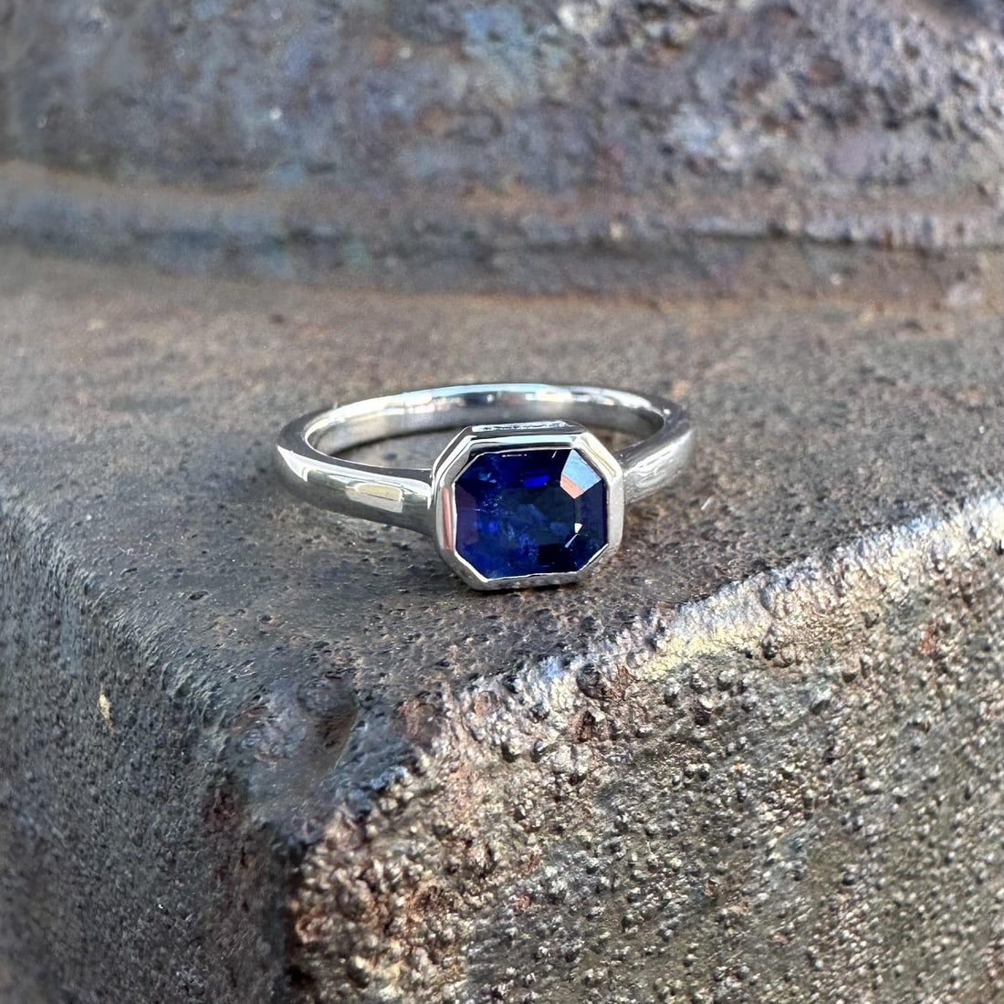 GIA Certified Platinum Ring with 1.21ct No Heat Blue Step Cut Sapphire: GIA Certified Platinum Ring with 1.21ct No Heat Blue Step Cut Sapphire This un-used platinum ring features a natural deep blue sapphire, weighing 1.21 carats and certified by GIA. The sapphire is cut