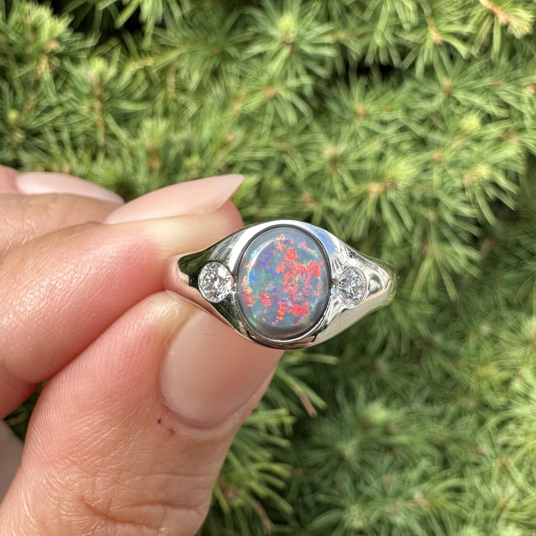 Vintage GIA Certified 1.26ctw Gray Opal Diamond Platinum Ring: Vintage GIA Certified 1.26ctw Gray Opal Diamond Platinum Ring This exquisite vintage platinum ring features a stunning 1.26ctw gray opal at its center, beautifully complemented by diamond accents. The