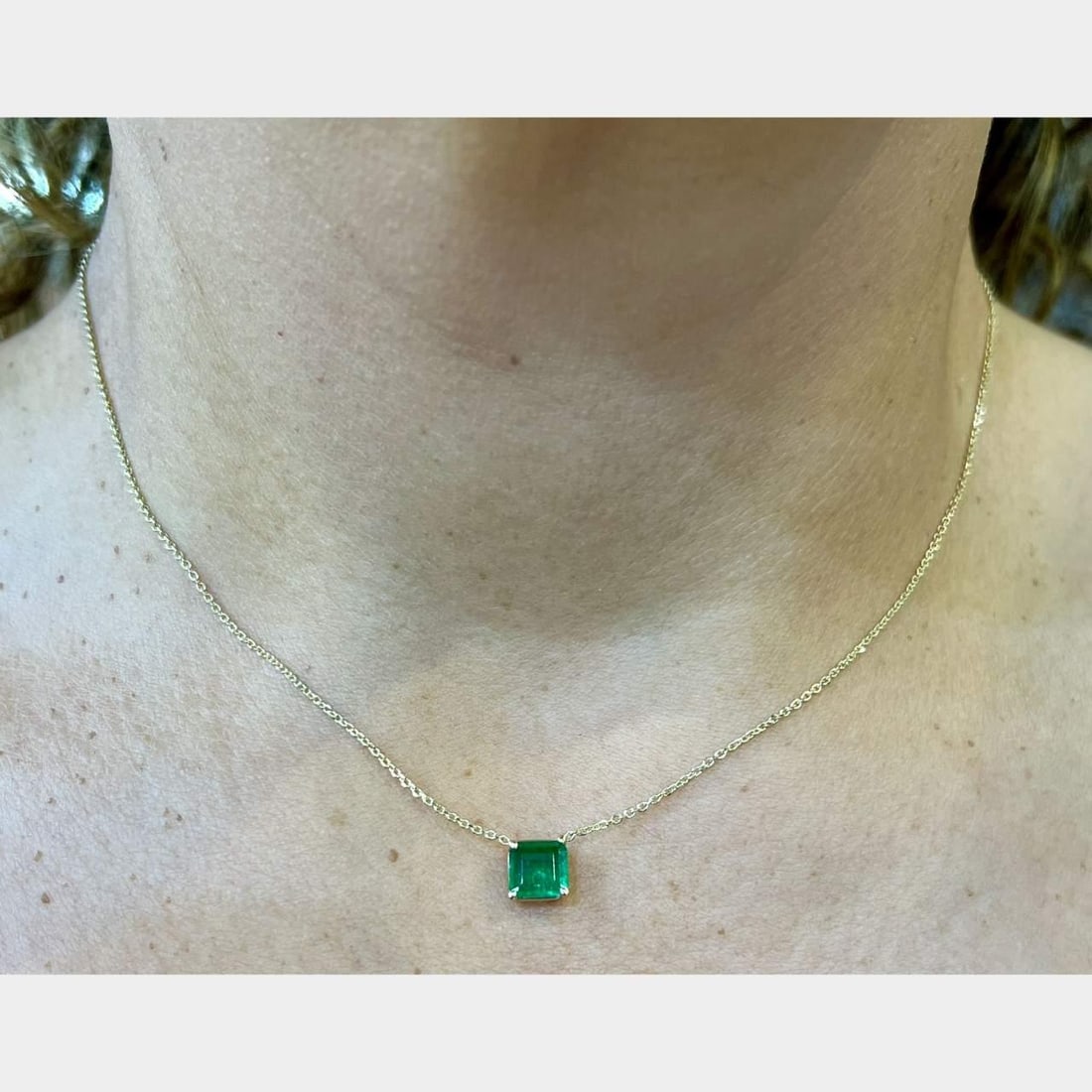 14K Yellow Gold 1.30 Ct Emerald Necklace 16 Inches: 14K Yellow Gold 1.30 Ct Emerald Necklace 16 Inches This exquisite necklace features a stunning 1.30 Ct. emerald elegantly set in 14K yellow gold. Weighing 2.5 grams, this piece is a perfect addition