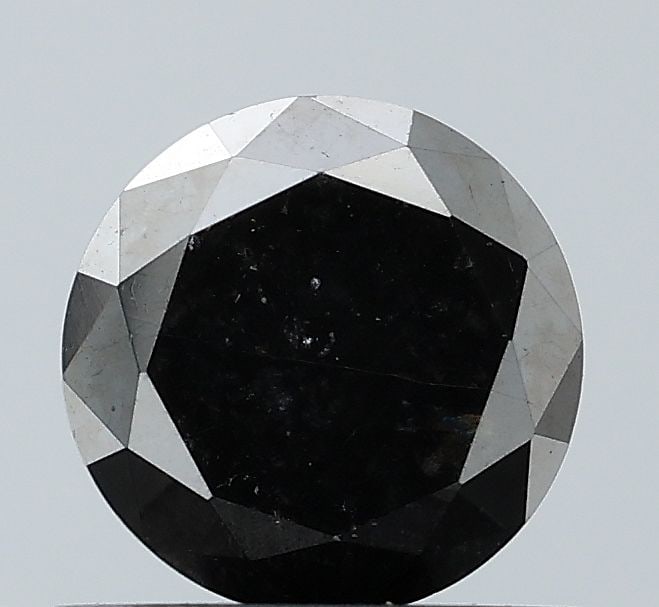 Loose Diamond - ROUND 0.86ct Fancy Black VVS2: Loose Diamond - ROUND 0.86ct Fancy Black VVS2 Source: Natural Shape: ROUND Carats: 0.86 Color: Fancy Black Certification: NONE Video: