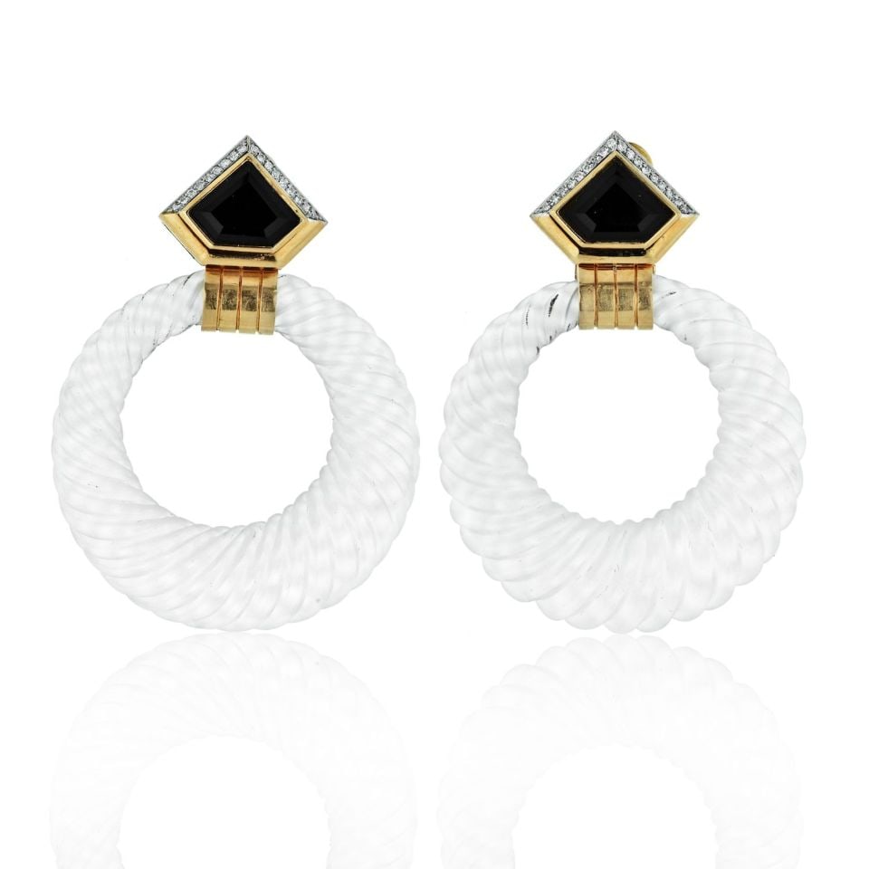 David Webb 18K Yellow Gold Rock Crystal Diamond Hoop Earrings: David Webb 18K Yellow Gold Rock Crystal Diamond Hoop Earrings These exquisite David Webb earrings feature a stunning design crafted from 18K yellow gold. The earrings showcase an impressive shield-sha