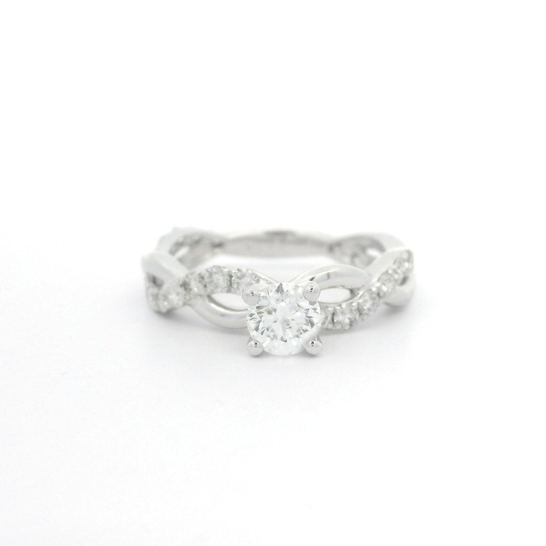 14K White Gold 0.78ctw Diamond Twisted Braided Engagement Ring: 14K White Gold 0.78ctw Diamond Twisted Braided Engagement Ring This exquisite engagement ring features a modern twisted braided design crafted from 14K solid white gold. At its center, a stunning natu