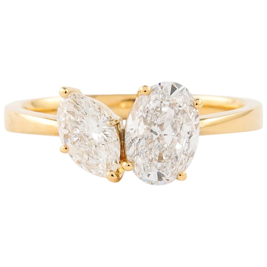 1.43ct Diamond Toi Et Moi Ring in 18k Yellow Gold: 1.43ct Diamond Toi Et Moi Ring in 18k Yellow Gold This exquisite Toi Et Moi ring features a stunning combination of an oval diamond and a marquise diamond, totaling 1.43 carats. The oval diamond, weig
