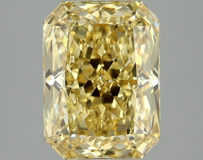 Loose Diamond - RADIANT 3.08ct Fancy Vivid Yellow VS1: Loose Diamond - RADIANT 3.08ct Fancy Vivid Yellow VS1 Source: This is a real non-mined Diamond that has been grown in a lab Shape: RADIANT Carats: 3.08 Color: Fancy Vivid Yellow Certification: IGI