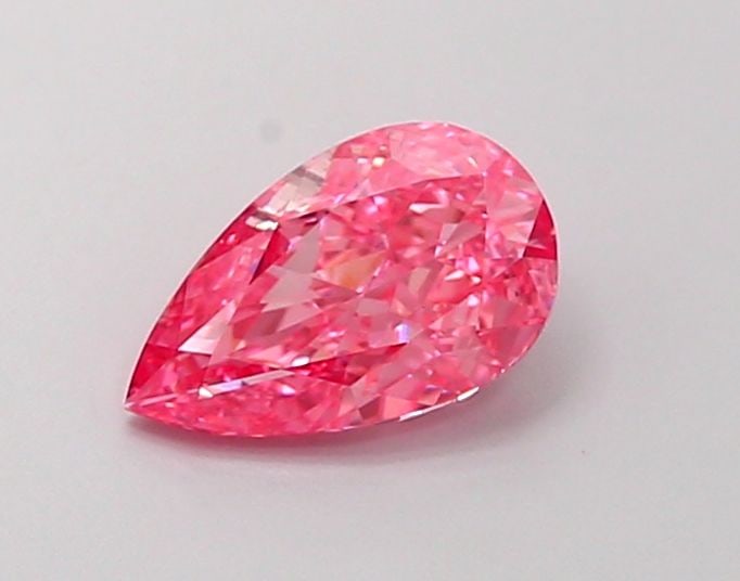 Loose Diamond - PEAR 1.02ct Fancy Vivid Pink VVS2: Loose Diamond - PEAR 1.02ct Fancy Vivid Pink VVS2 Source: This is a real non-mined Diamond that has been grown in a lab Shape: PEAR Carats: 1.02 Color: Fancy Vivid Pink Certification: IGI Video: