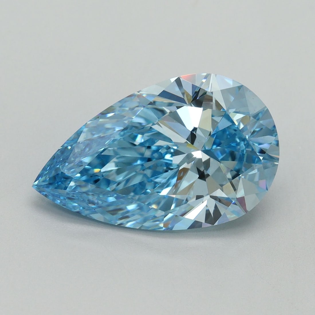 Loose Diamond - PEAR 5.01ct Fancy Vivid Blue VS1: Loose Diamond - PEAR 5.01ct Fancy Vivid Blue VS1 Source: This is a real non-mined Diamond that has been grown in a lab Shape: PEAR Carats: 5.01 Color: Fancy Vivid Blue Certification: IGI Video: