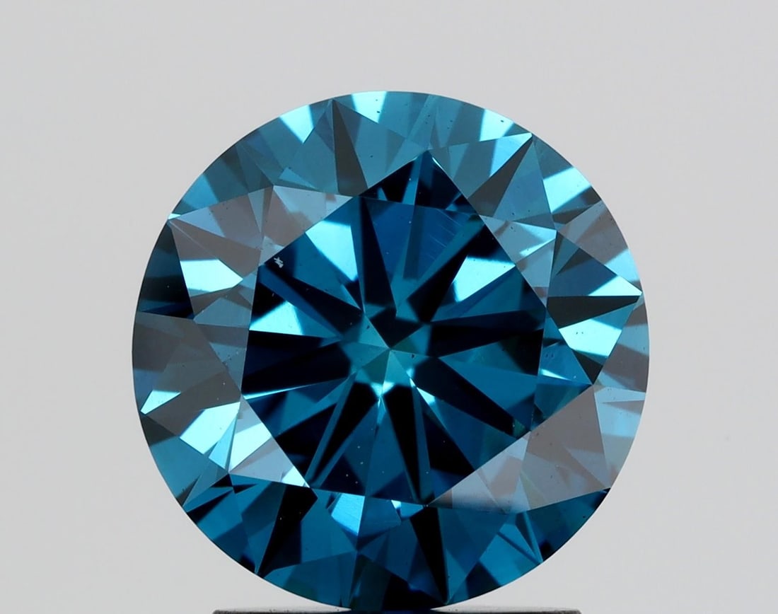 Loose Diamond - ROUND 2.15ct Fancy Blue VS2: Loose Diamond - ROUND 2.15ct Fancy Blue VS2 Source: This is a real non-mined Diamond that has been grown in a lab Shape: ROUND Carats: 2.15 Color: Fancy Blue Certification: NONE Video: Video Link 
