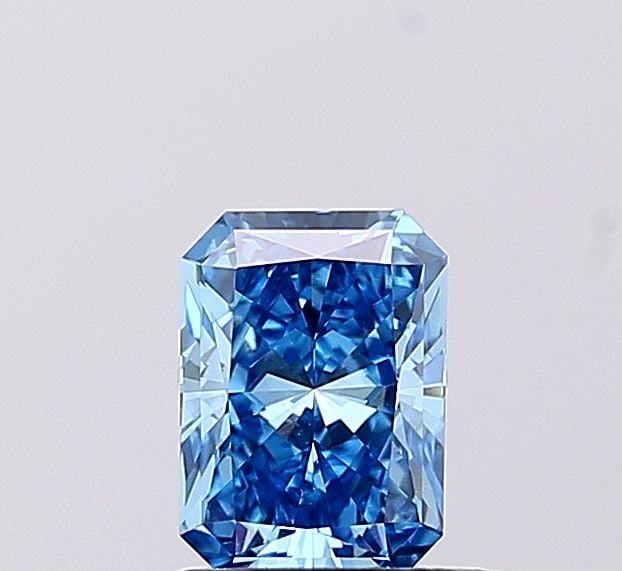 Loose Diamond - RADIANT 0.77ct Fancy Vivid Blue VS1: Loose Diamond - RADIANT 0.77ct Fancy Vivid Blue VS1 Source: This is a real non-mined Diamond that has been grown in a lab Shape: RADIANT Carats: 0.77 Color: Fancy Vivid Blue Certification: IGI 