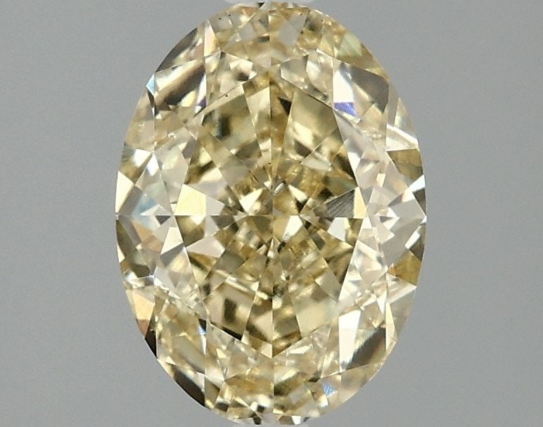 Loose Diamond - OVAL 2.08ct Fancy Vivid Yellow VS1: Loose Diamond - OVAL 2.08ct Fancy Vivid Yellow VS1 Source: This is a real non-mined Diamond that has been grown in a lab Shape: OVAL Carats: 2.08 Color: Fancy Vivid Yellow Certification: IGI Video: