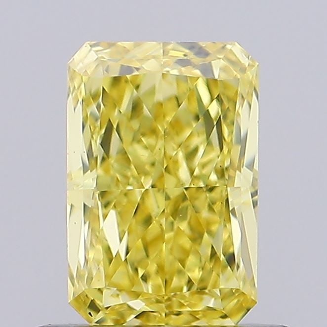 Loose Diamond - RADIANT 0.77ct Fancy Vivid Yellow VS2: Loose Diamond - RADIANT 0.77ct Fancy Vivid Yellow VS2 Source: This is a real non-mined Diamond that has been grown in a lab Shape: RADIANT Carats: 0.77 Color: Fancy Vivid Yellow Certification: IGI