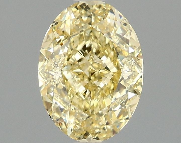 Loose Diamond - OVAL 1.59ct Fancy Intense Yellow VVS2: Loose Diamond - OVAL 1.59ct Fancy Intense Yellow VVS2 Source: This is a real non-mined Diamond that has been grown in a lab Shape: OVAL Carats: 1.59 Color: Fancy Intense Yellow Certification: IGI