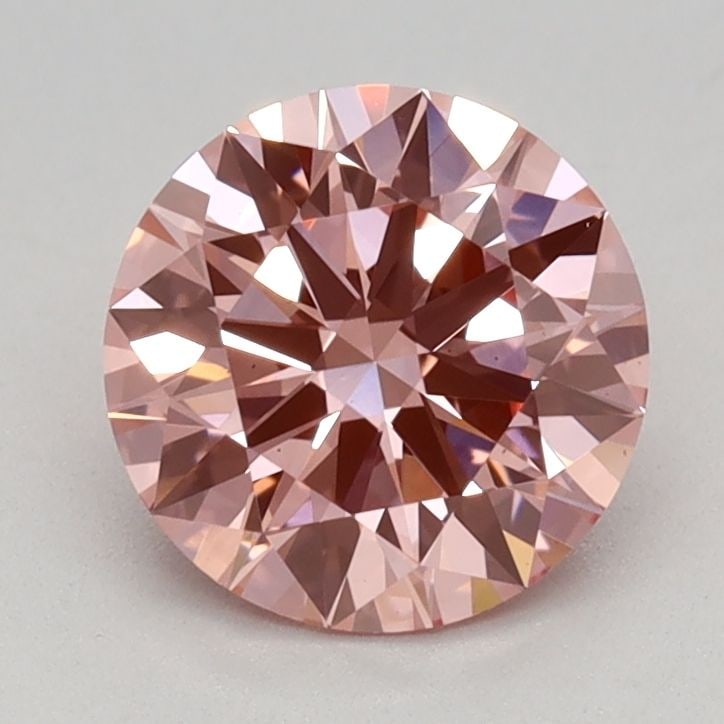 Ideal Loose Diamond - ROUND 0.97ct Fancy Vivid Pink VS1: Ideal Loose Diamond - ROUND 0.97ct Fancy Vivid Pink VS1 Source: This is a real non-mined Diamond that has been grown in a lab Shape: ROUND Carats: 0.97 Color: Fancy Vivid Pink Certification: IGI
