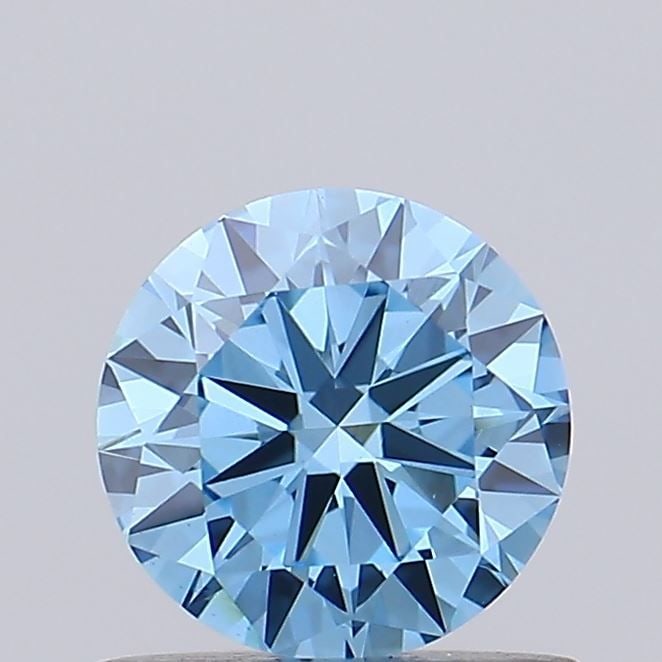 Loose Diamond - ROUND 0.64ct Fancy Vivid Blue VVS2: Loose Diamond - ROUND 0.64ct Fancy Vivid Blue VVS2 Source: This is a real non-mined Diamond that has been grown in a lab Shape: ROUND Carats: 0.64 Color: Fancy Vivid Blue Certification: IGI Video: