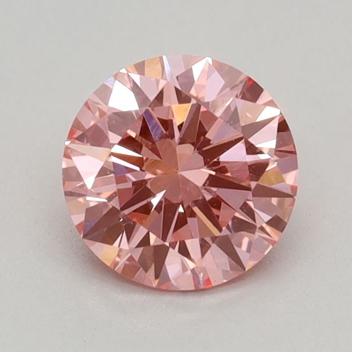 Loose Diamond - ROUND 0.46ct Fancy Vivid Pink VVS2: Loose Diamond - ROUND 0.46ct Fancy Vivid Pink VVS2 Source: This is a real non-mined Diamond that has been grown in a lab Shape: ROUND Carats: 0.46 Color: Fancy Vivid Pink Certification: IGI Video: