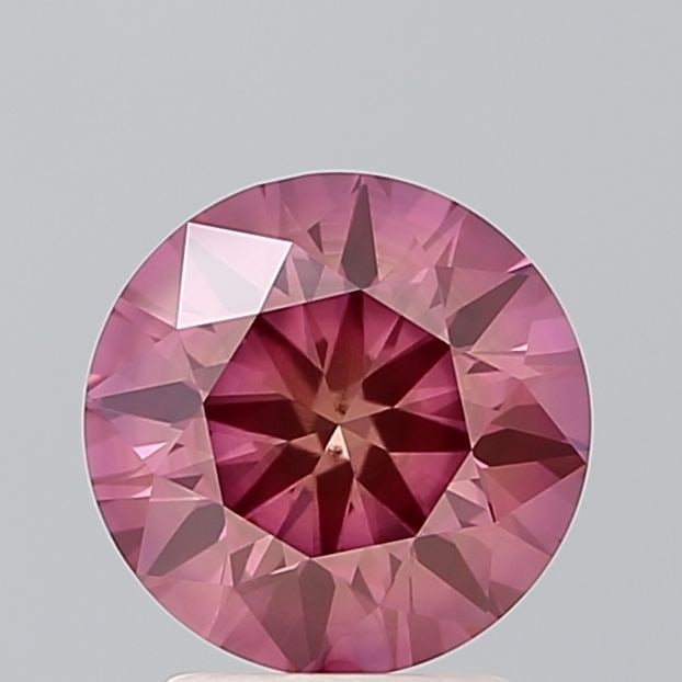 Loose Diamond - ROUND 2.1ct Fancy Vivid Pink VS2: Loose Diamond - ROUND 2.1ct Fancy Vivid Pink VS2 Source: This is a real non-mined Diamond that has been grown in a lab Shape: ROUND Carats: 2.1 Color: Fancy Vivid Pink Certification: IGI Video:
