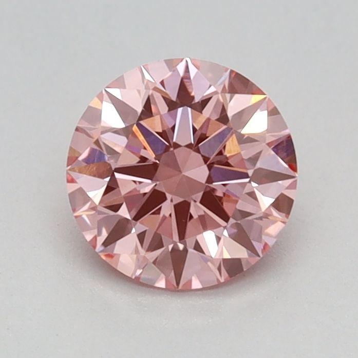 Ideal Loose Diamond - ROUND 0.58ct Fancy Vivid Pink VVS2: Ideal Loose Diamond - ROUND 0.58ct Fancy Vivid Pink VVS2 Source: This is a real non-mined Diamond that has been grown in a lab Shape: ROUND Carats: 0.58 Color: Fancy Vivid Pink Certification: IGI