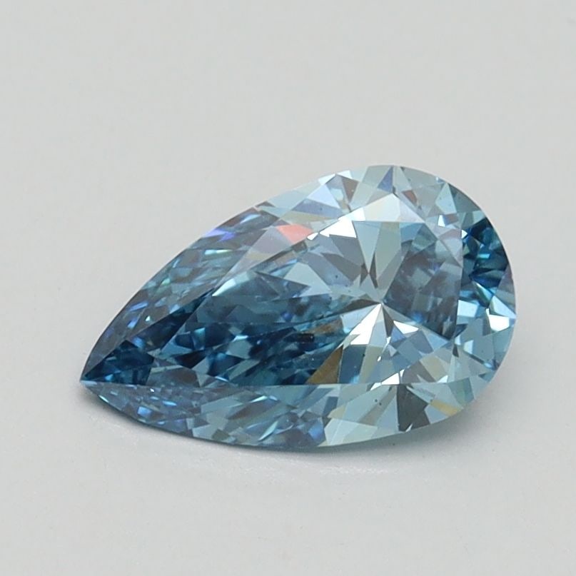 Loose Diamond - PEAR 0.74ct Fancy Vivid Blue VS1: Loose Diamond - PEAR 0.74ct Fancy Vivid Blue VS1 Source: This is a real non-mined Diamond that has been grown in a lab Shape: PEAR Carats: 0.74 Color: Fancy Vivid Blue Certification: IGI Video: