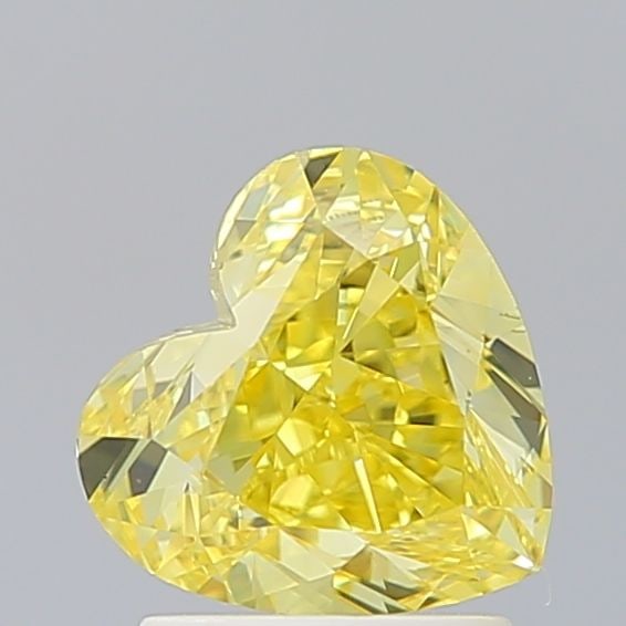 Loose Diamond - HEART 2.0ct Fancy Vivid Yellow VS1: Loose Diamond - HEART 2.0ct Fancy Vivid Yellow VS1 Source: This is a real non-mined Diamond that has been grown in a lab Shape: HEART Carats: 2.0 Color: Fancy Vivid Yellow Certification: IGI Video: