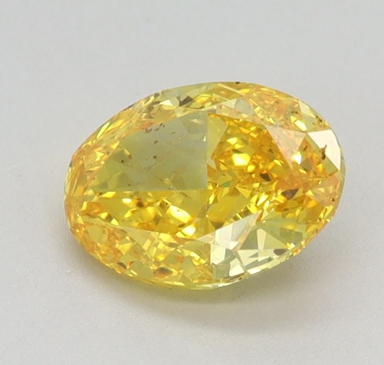 Loose Diamond - OVAL 0.83ct Fancy Vivid Yellow VVS2: Loose Diamond - OVAL 0.83ct Fancy Vivid Yellow VVS2 Source: This is a real non-mined Diamond that has been grown in a lab Shape: OVAL Carats: 0.83 Color: Fancy Vivid Yellow Certification: IGI Video: