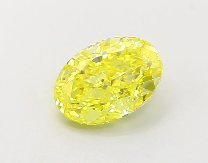 Loose Diamond - OVAL 1.01ct Fancy Vivid Yellow VVS1: Loose Diamond - OVAL 1.01ct Fancy Vivid Yellow VVS1 Source: This is a real non-mined Diamond that has been grown in a lab Shape: OVAL Carats: 1.01 Color: Fancy Vivid Yellow Certification: IGI Video: