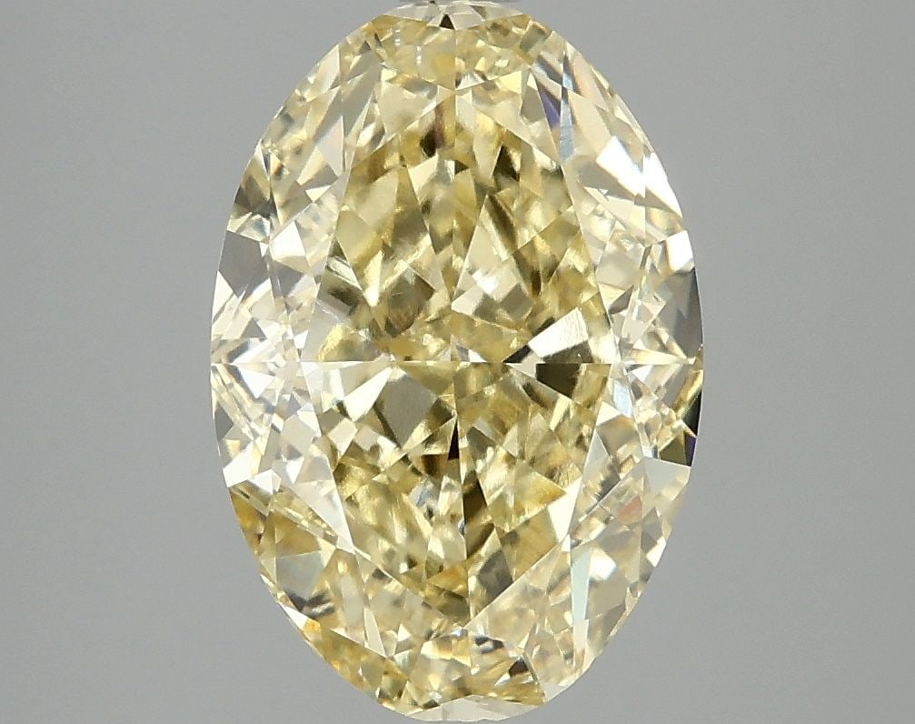 Loose Diamond - OVAL 4.03ct Fancy Vivid Yellow VS1: Loose Diamond - OVAL 4.03ct Fancy Vivid Yellow VS1 Source: This is a real non-mined Diamond that has been grown in a lab Shape: OVAL Carats: 4.03 Color: Fancy Vivid Yellow Certification: IGI Video: