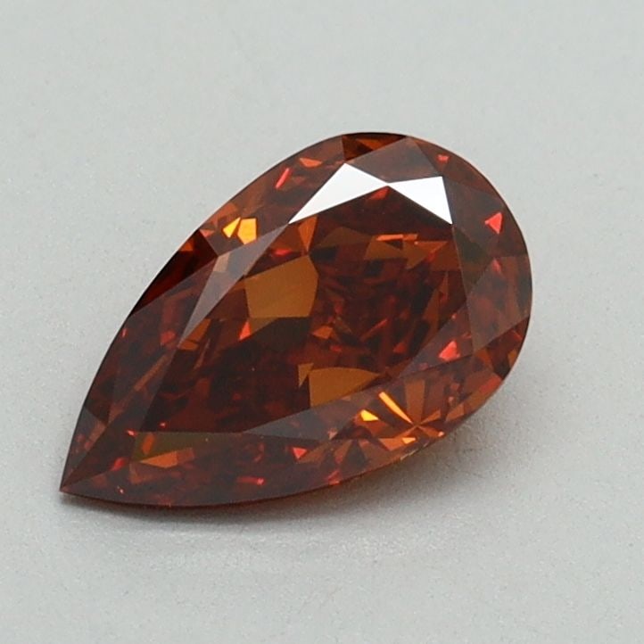 Loose Diamond - PEAR 0.82ct Fancy Orange VVS2: Loose Diamond - PEAR 0.82ct Fancy Orange VVS2 Source: This is a real non-mined Diamond that has been grown in a lab Shape: PEAR Carats: 0.82 Color: Fancy Orange Certification: IGI Video: Video Link 