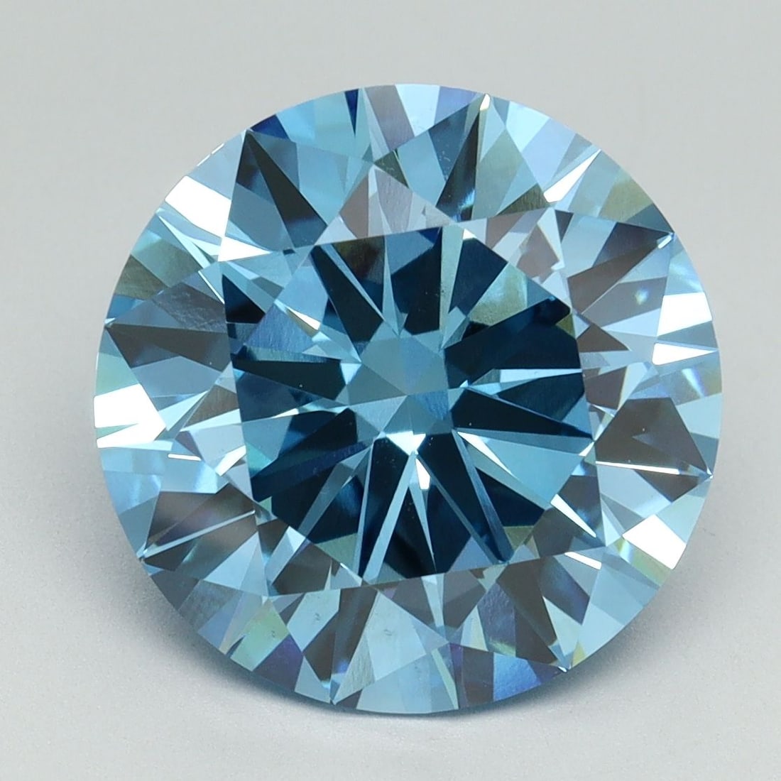 Loose Diamond - ROUND 6.1ct Fancy Vivid Blue VS1: Loose Diamond - ROUND 6.1ct Fancy Vivid Blue VS1 Source: This is a real non-mined Diamond that has been grown in a lab Shape: ROUND Carats: 6.1 Color: Fancy Vivid Blue Certification: IGI Video: